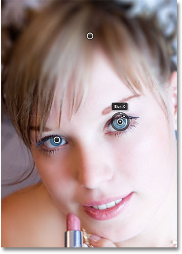 Bringing back the sharpness in the eyes with two additional pins. Image © 2012 Photoshop Essentials.com