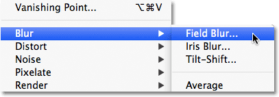 Selecting Field Blur from the Filter menu in Photoshop CS6. Image © 2012 Photoshop Essentials.com