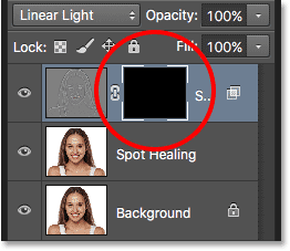 A black-filled layer mask has been added to the Soften Skin layer. Image © 2016 Steve Patterson, Photoshop Essentials.com