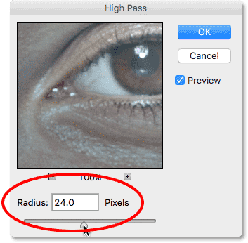 Setting the Radius value for the High Pass filter to 24 pixels. Image © 2016 Steve Patterson, Photoshop Essentials.com