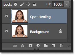 The Layers panel showing the Spot Healing layer. Image © 2016 Steve Patterson, Photoshop Essentials.com