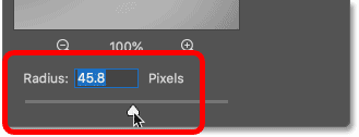 Increasing the radius value in the Gaussian Blur dialog box. 