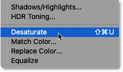 Choosing the Desaturate command in Photoshop.