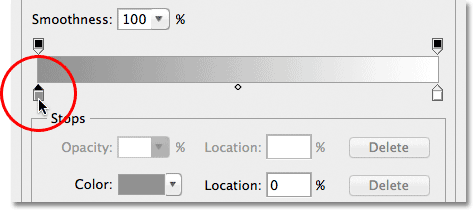 Double-clicking the gray color stop in the Gradient Editor.