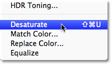 Choosing the Desaturate command in Photoshop.