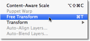 Selecting the Free Transform command in Photoshop.