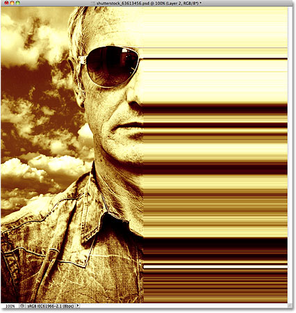The pixel column has been stretched across the right half of the photo. Image © 2010 Photoshop Essentials.com.