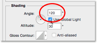 Changing the Angle value for the Bevel and Emboss layer effect.