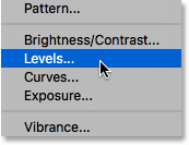 Choosing a Levels adjustment layer. 