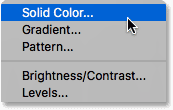 Choosing a Solid Color fill layer in Photoshop. 