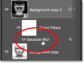 The Layers panel showing the Gaussian Blur Smart Filter. 