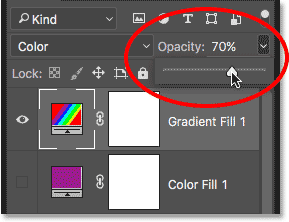 Lowering the opacity of the Gradient Fill layer. 