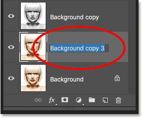 Double-clicking on the layer's name to highlight it. 