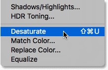 Choosing the Desaturate command in Photoshop. 