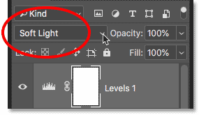 Changing the blend mode of the Levels adjustment layer to Soft Light in Photoshop