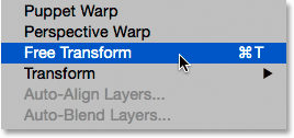 Selecting the Free Transform command in Photoshop. 