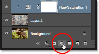 Clicking the New Adjustment Layer icon.