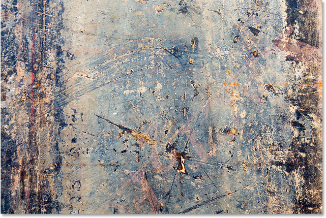 A rusted and scratched metal texture.