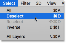 Choosing Deselect from under the Select menu in Photoshop. 