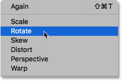 Selecting the Rotate command in Photoshop. 