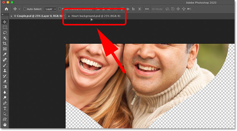 Dragging the shape onto the tab for the background image document in Photoshop