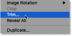 Selecting the Trim command in Photoshop