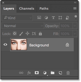 The Layers panel showing the photo on the Background layer. 