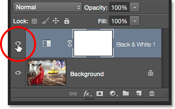 Clicking the Black and White adjustment layer's visibility icon. Image © 2015 Photoshop Essentials.com.