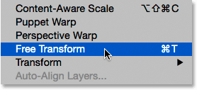 Selecting Free Transform from under the Edit menu. Image © 2015 Photoshop Essentials.com.