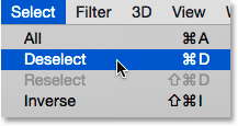 Choosing Deselect from under the Select menu. Image © 2015 Photoshop Essentials.com.