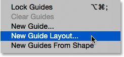 Selecting New Guide Layout from under the View menu in Photoshop CC. Image © 2015 Photoshop Essentials.com.