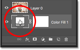 Double-clicking on the fill layer's color swatch in the Layers panel