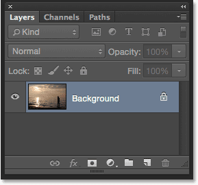 The Layers panel showing the photo on the Background layer. Image © 2016 Photoshop Essentials.com