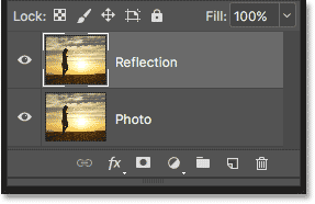 The Layers panel showing the Reflection layer above the Photo layer