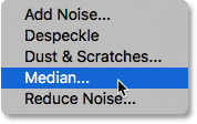 Selecting the Median filter from the Filter menu in Photoshop CS6. Image © 2013 Photoshop Essentials.com