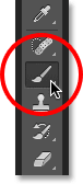 Selecting the Brush Tool from the Tools panel.