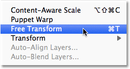 Selecting the Free Transform command in Photoshop.