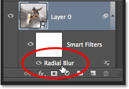 انقر نقرًا مزدوجًا فوق Radial Blur Smart Filter في لوحة Layers لإعادة فتحه.  صورة © 2013 Photoshop Essentials.com