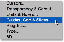 Selecting Guides, Grid and Slices in the Preferences. Image © 2014 Photoshop Essentials.com.