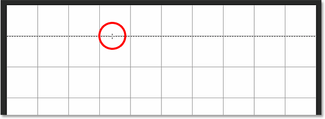 Clicking on the grid line with the Single Row Marquee Tool. 