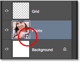 The layer preview thumbnail showing the Smart Object icon. Image © 2014 Photoshop Essentials.com.