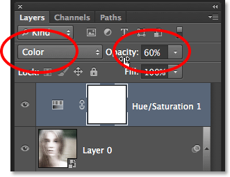 Changing the blend mode and lowering the opacity of the Hue/Saturation adjustment layer.