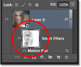 The Smart Filter mask thumbnail showing the areas that were painted over with black.