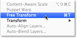 Selecting the Free Transform command from the Edit menu. Image © 2014 Photoshop Essentials.com