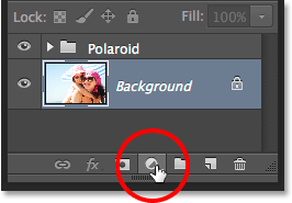 Clicking the New Fill or Adjustment Layer icon in the Layers panel. Image © 2014 Photoshop Essentials.com