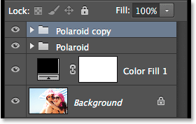 The Layers panel showing two polaroid layer groups.