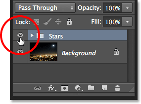 Clicking the layer group visibility icon in the Layers panel.