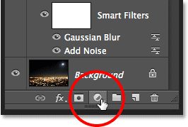 Clicking the New Adjustment Layer icon in the Layers panel.