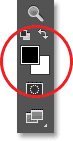 The Foreground and Background color swatches in the Tools panel. Image © 2013 Photoshop Essentials.com