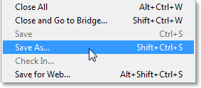 Choosing the Save As command from the File menu. Image © 2013 Photoshop Essentials.com